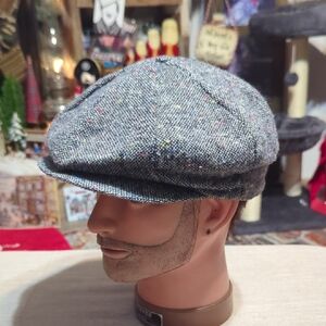 tweed newsboy cap, also commonly referred to as an eight-panel cap or baker boy
